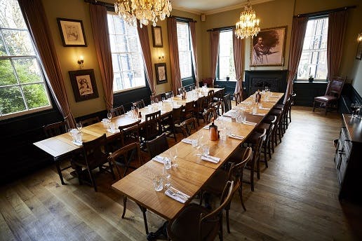 Romney Room at The Holly Bush: elegant meeting space for corporate events with chandeliers.