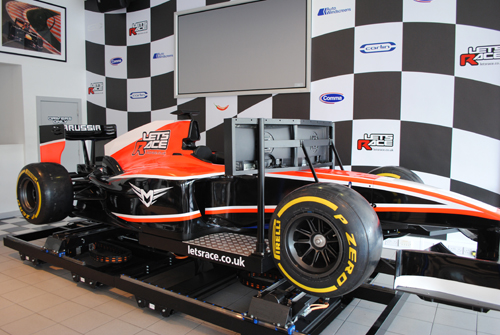 Sleek Formula 1 car at Let's Race venue, perfect for corporate events and promotions. - Banner
