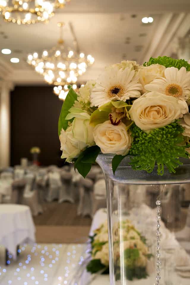 Elegant floral centerpiece in The Adelphi Suite, Waldorf Hilton for weddings and corporate events.