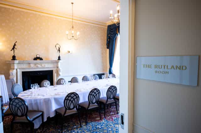 Rutland Room boardroom set for an elegant corporate dinner or executive meeting.