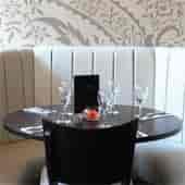 Elegant dining table on Mezzanine floor at Zouk Tea Bar & Grill for intimate events.
