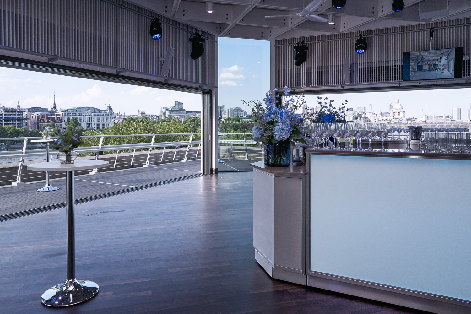 Buffini Chao Deck: modern event space with city views, ideal for receptions and networking. - Banner