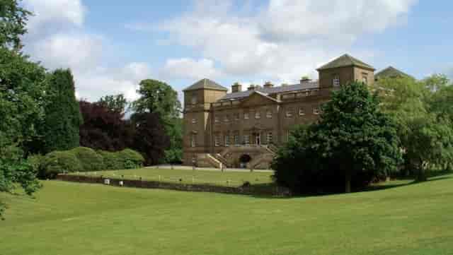 Crimson Dining Room at Hagley Hall, elegant venue for meetings and events.