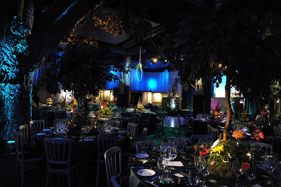 Elegant Underglobe event space with lush greenery, perfect for upscale galas and celebrations.