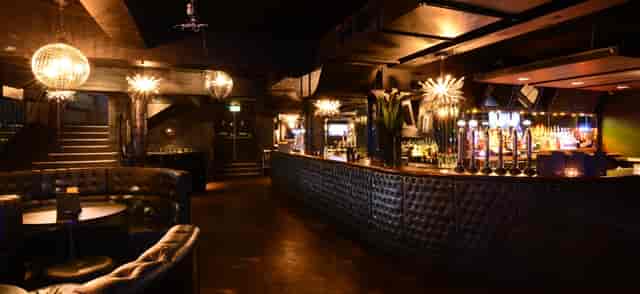 Stylish Loop Bar venue with sleek design, ideal for upscale events and gatherings.
