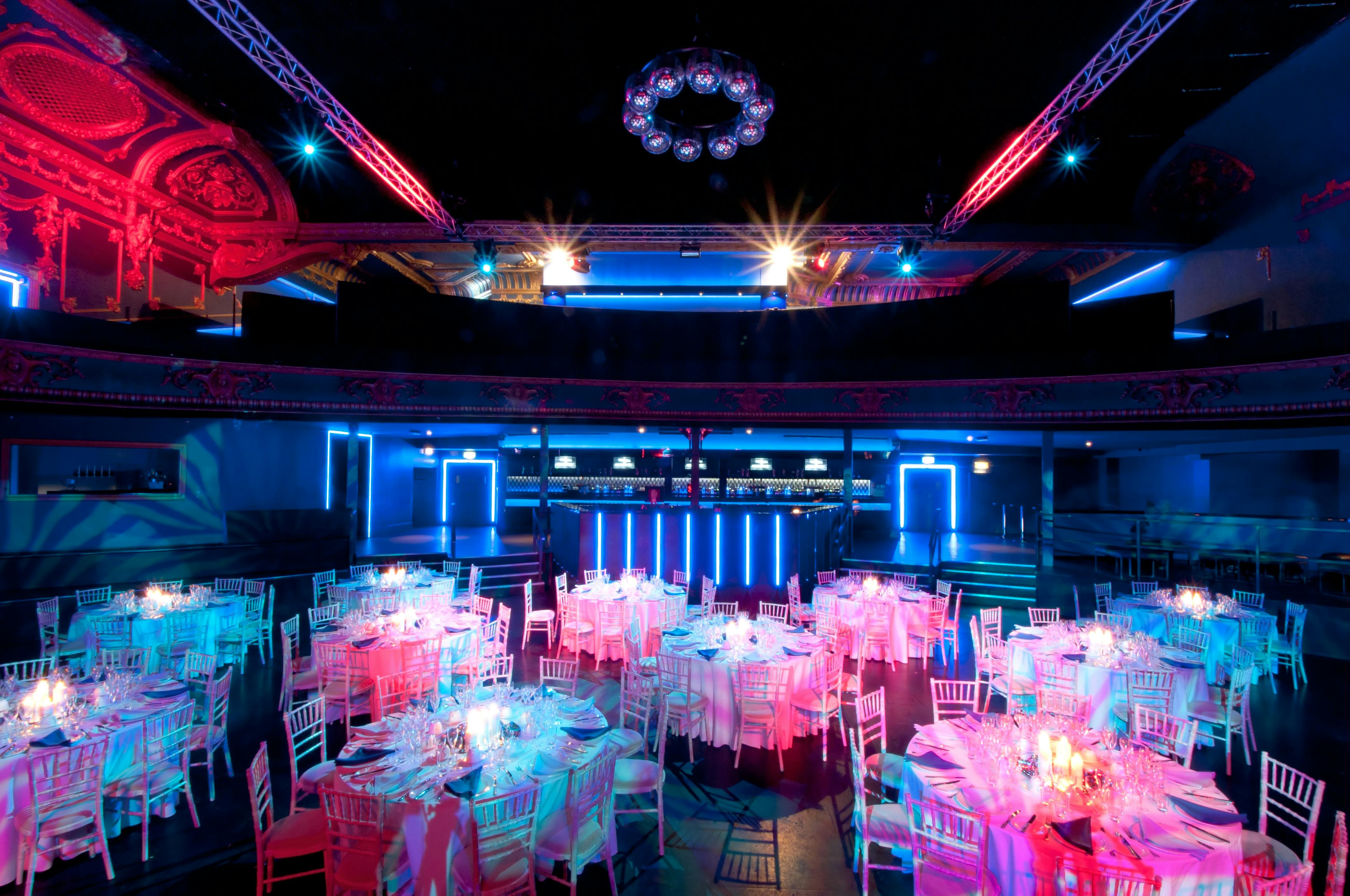 Electric Brixton gala setup with elegant tables and dramatic lighting for events.