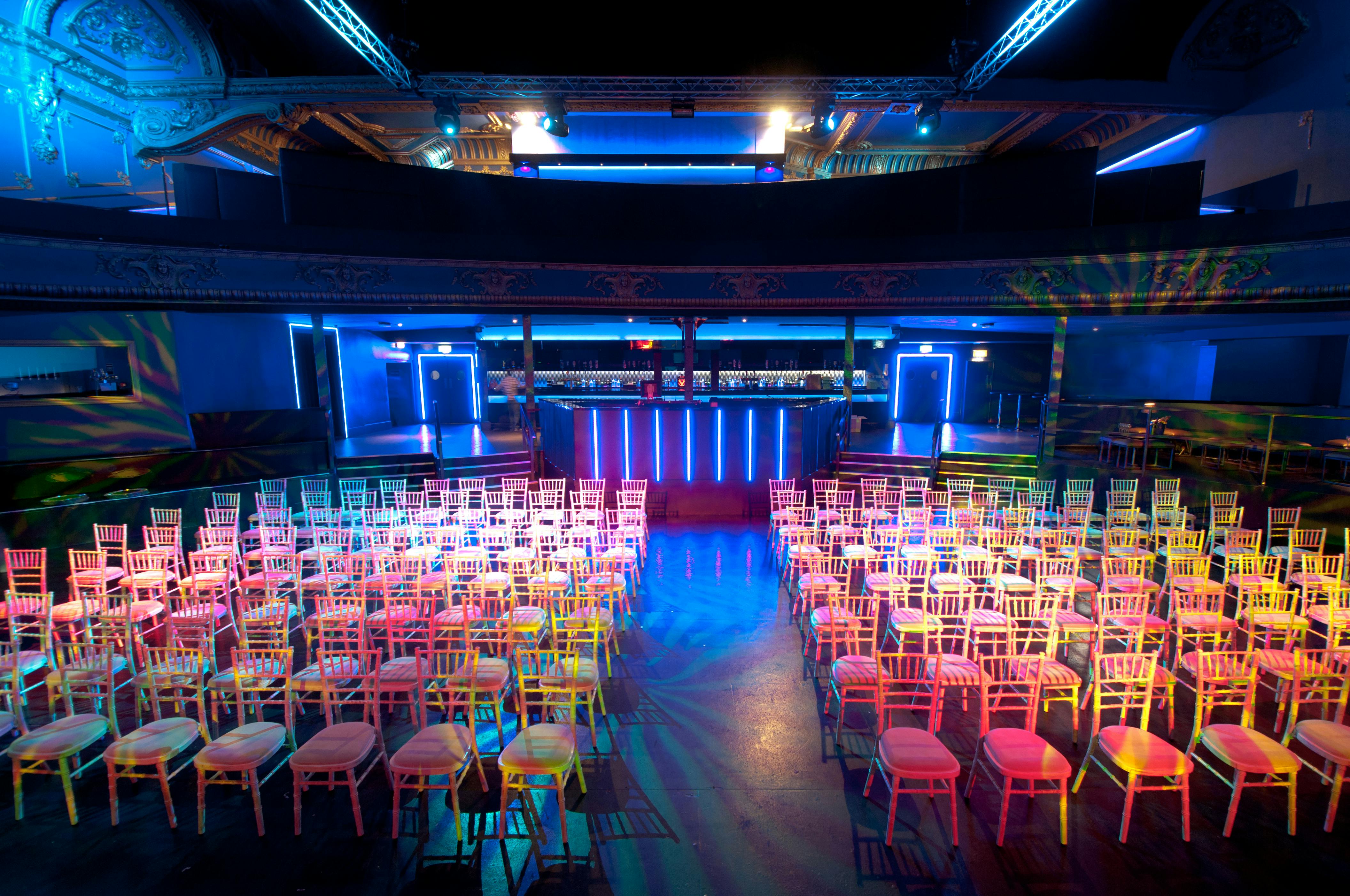 Electric Brixton event space with colorful chairs, ideal for conferences and workshops.