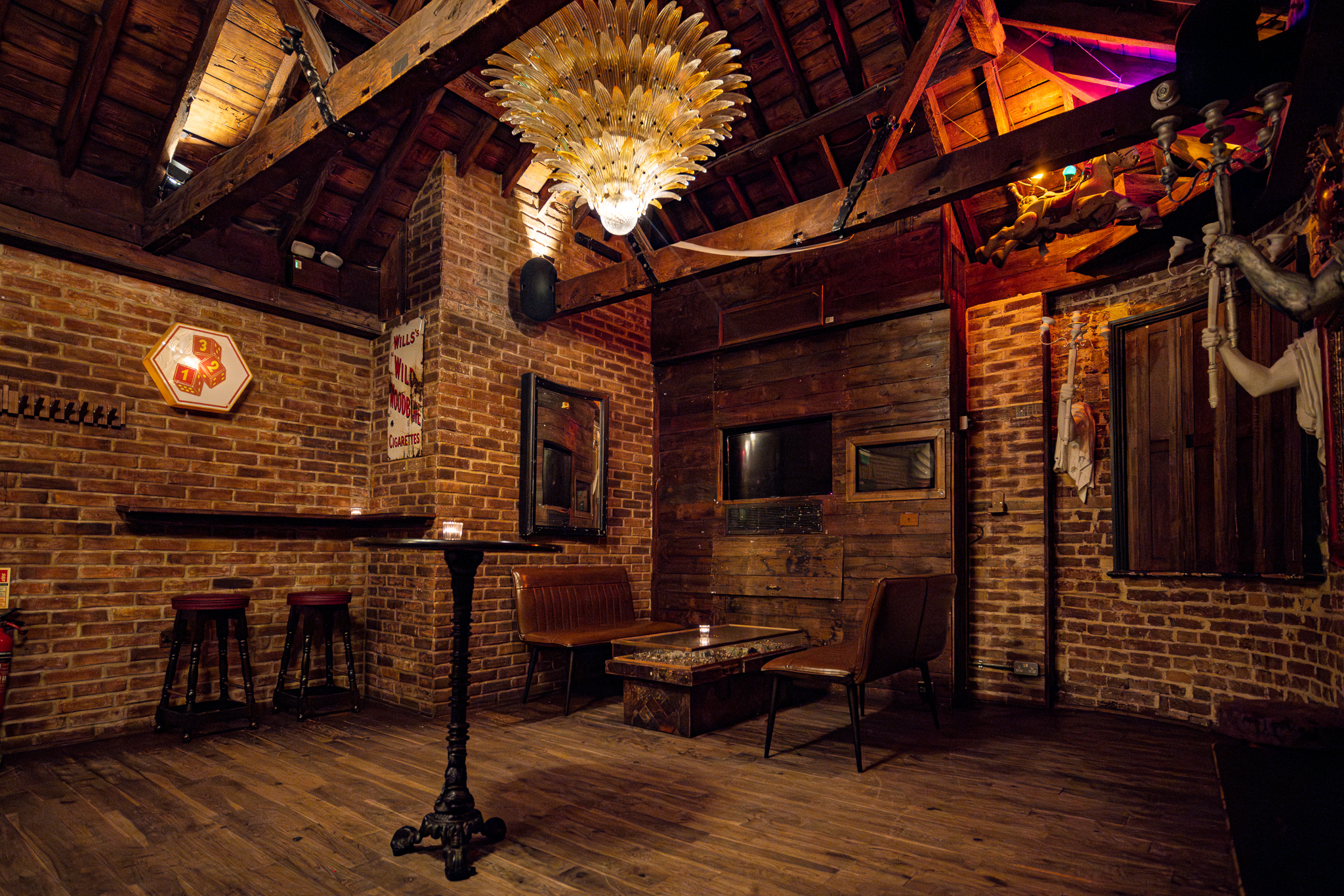 Intimate venue with exposed brick for small gatherings and private events. - Banner