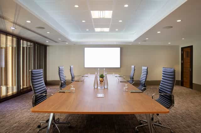 Modern conference room in Leonardo Royal Hotel, ideal for corporate events and meetings.