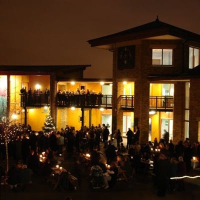 Tower at WWT London Wetland Centre during a festive evening networking event with Christmas tree.