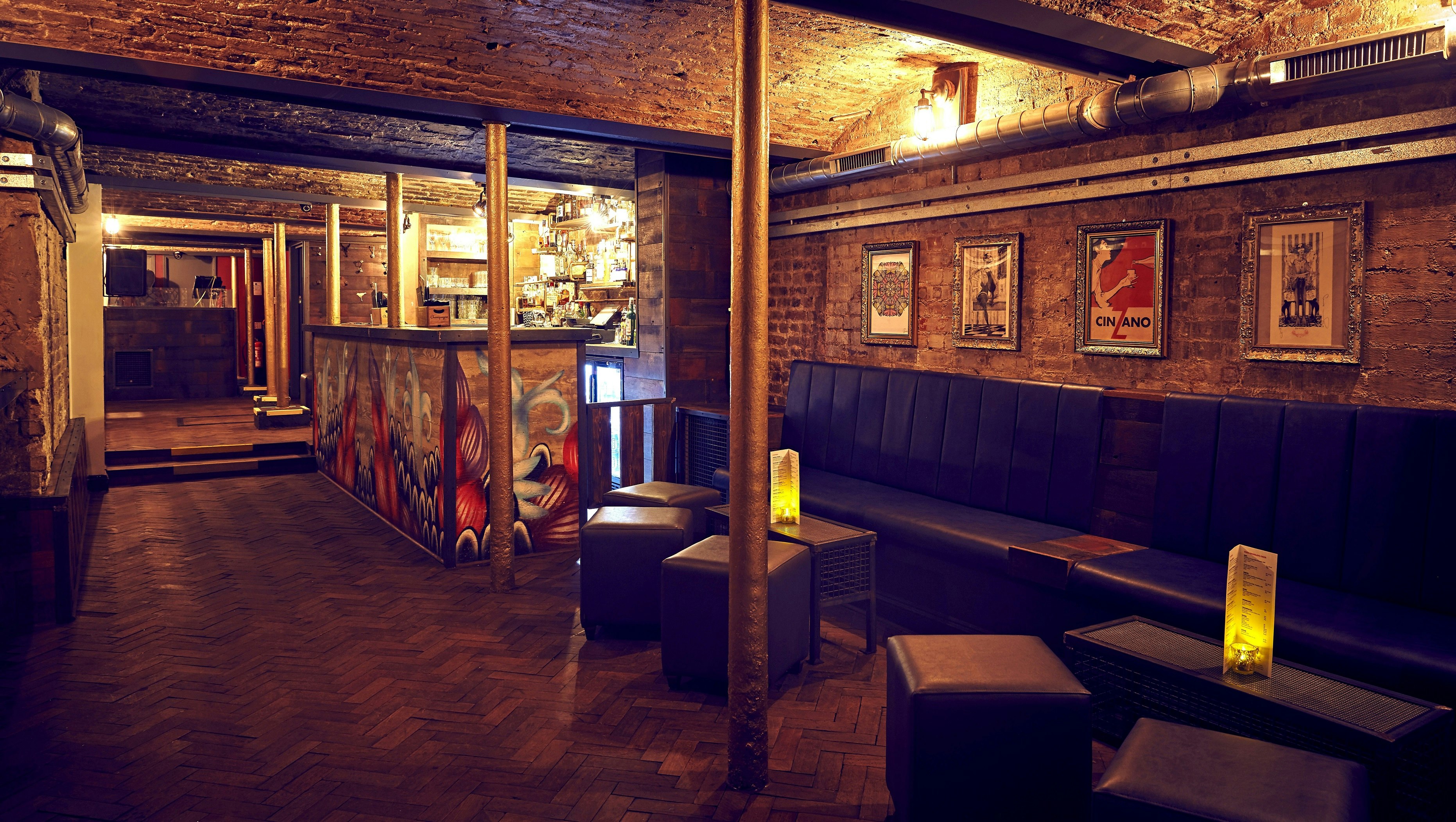 Intimate venue with exposed brick for small gatherings and networking events.