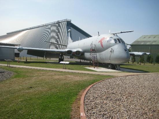 Visitor Centre at RAF Museum with vintage aircraft, ideal for corporate events and gatherings.