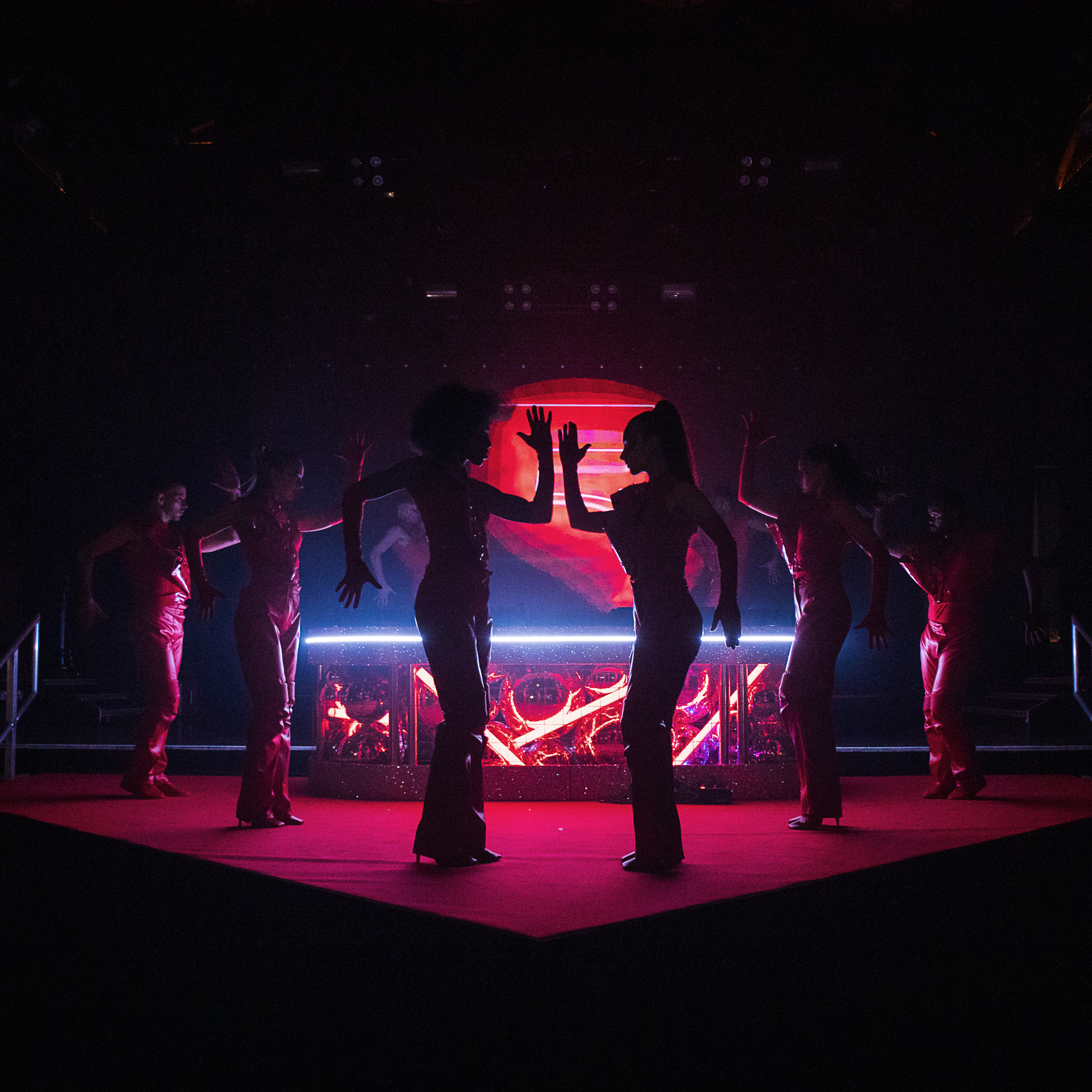 Dynamic performance venue KOKO with vibrant lighting, ideal for events and product launches. - Banner