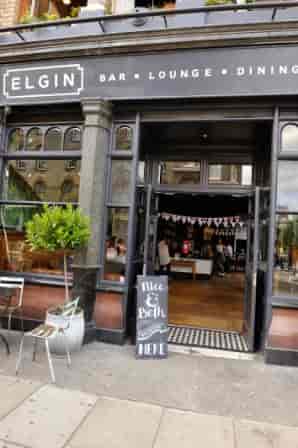 Welcoming venue entrance at Top Bar, The Elgin, ideal for events and gatherings.