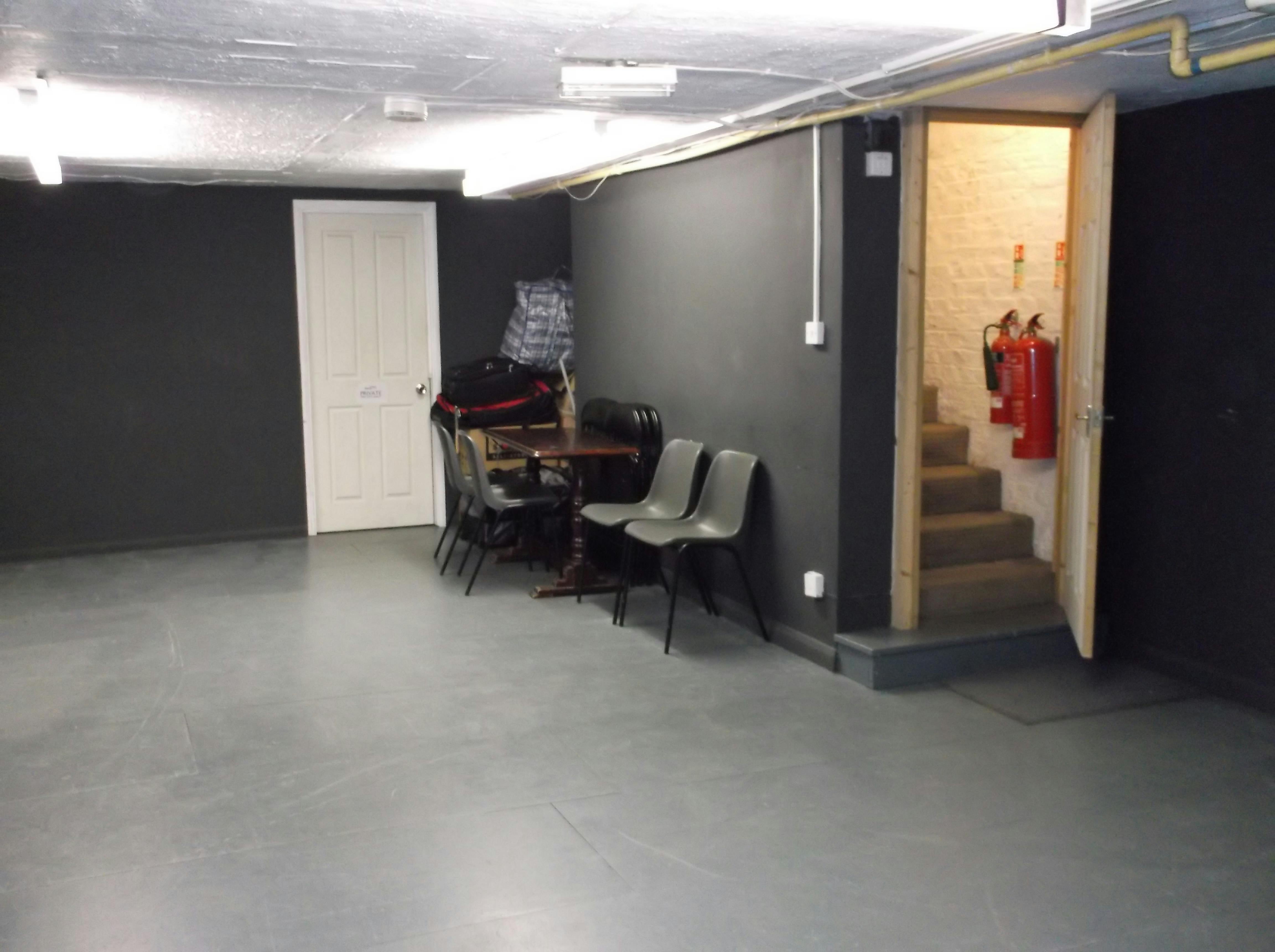 Versatile minimalist event space in The Calder Theatre Bookshop for workshops and gatherings.