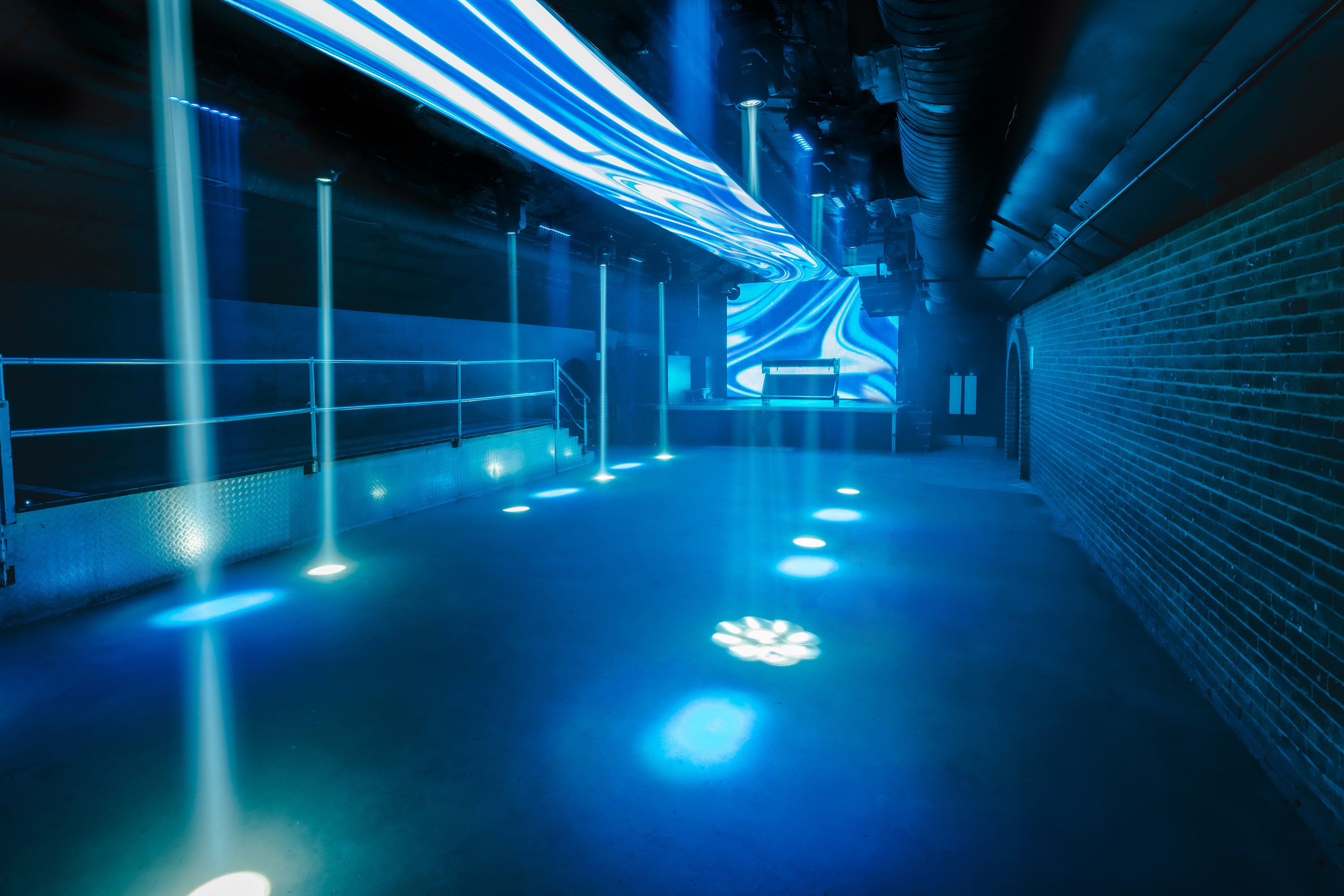 Modern event space with dynamic lighting for corporate and social gatherings.