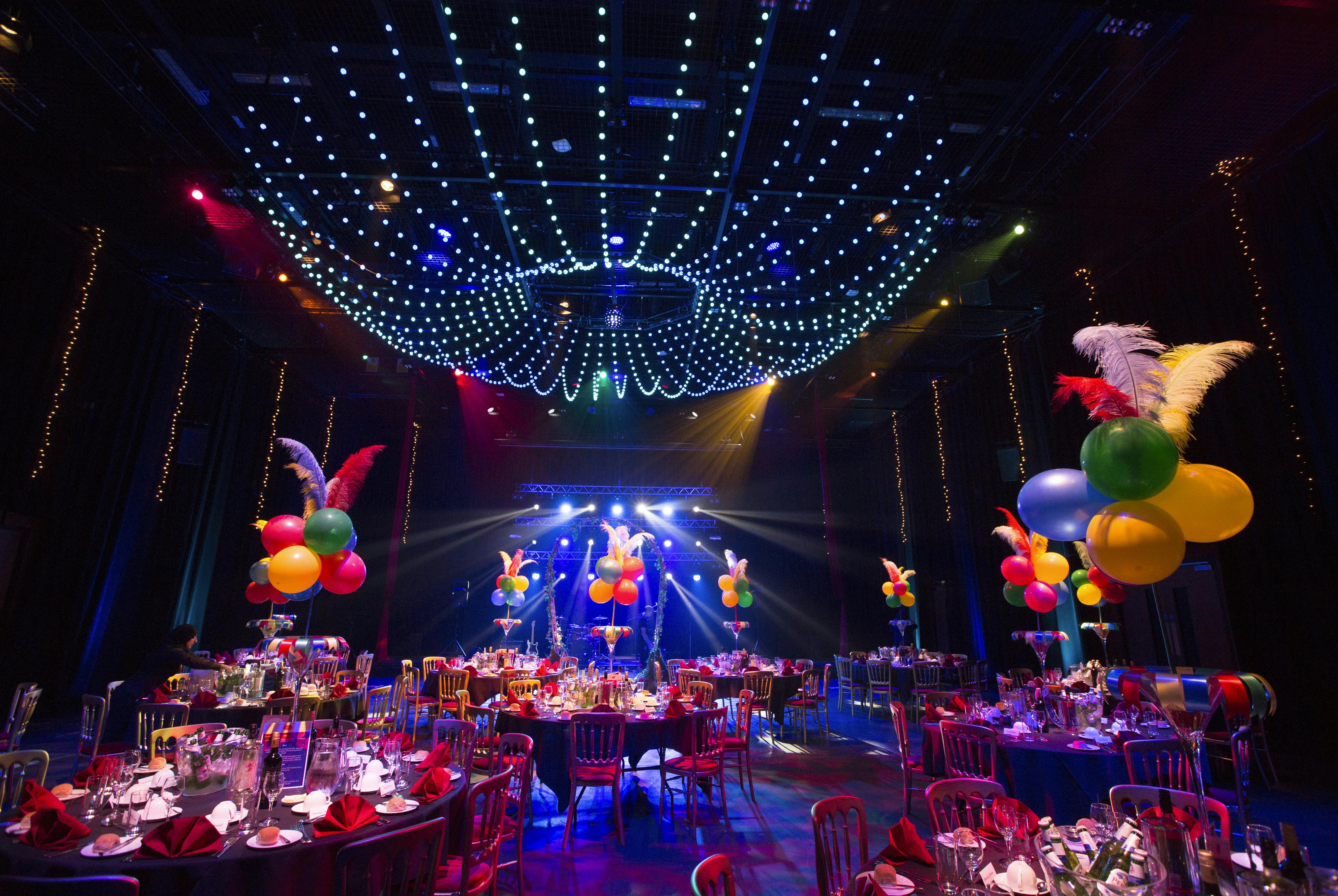 Vibrant Studio Theatre event space with colorful decor for festive celebrations and parties.