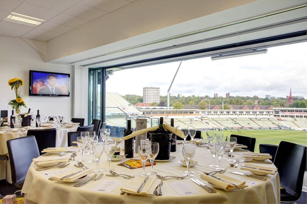 Executive Boxes at Edgbaston Stadium with elegant dining setup for corporate events.