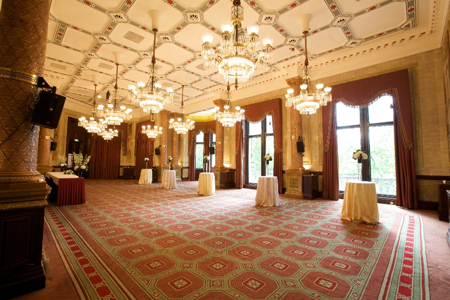 Elegant Reading & Writing Room with chandeliers, perfect for receptions and networking events.
