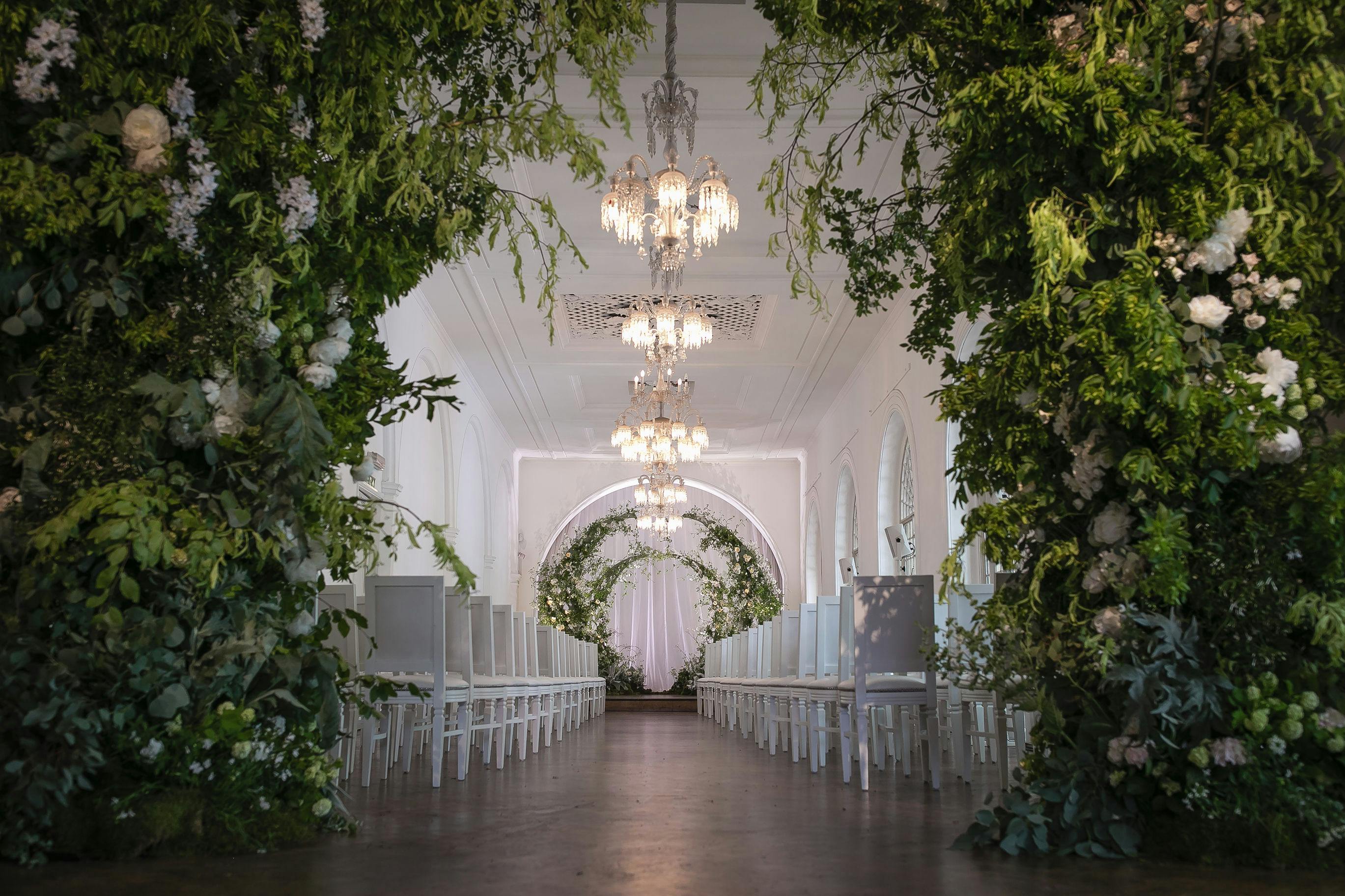 Elegant event space at One Marylebone with lush greenery, ideal for weddings and gatherings.