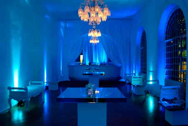 Elegant event space at One Marylebone with blue lighting and modern decor for upscale gatherings.