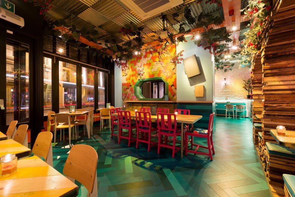 Vibrant event space in Shoreditch with colorful decor for networking and gatherings.