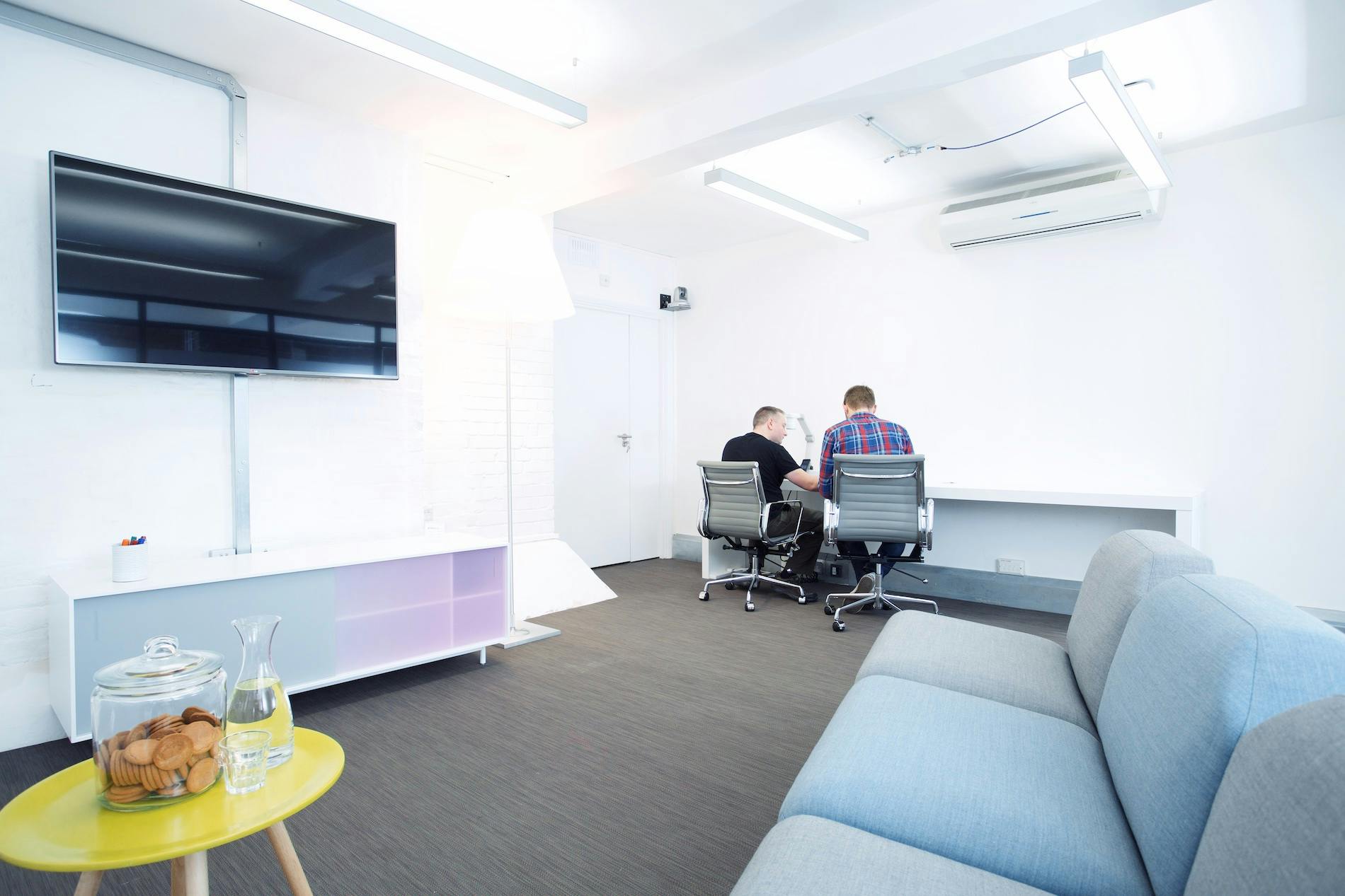 Modern meeting space in Sutherland Labs with sleek conference table for collaborative events.