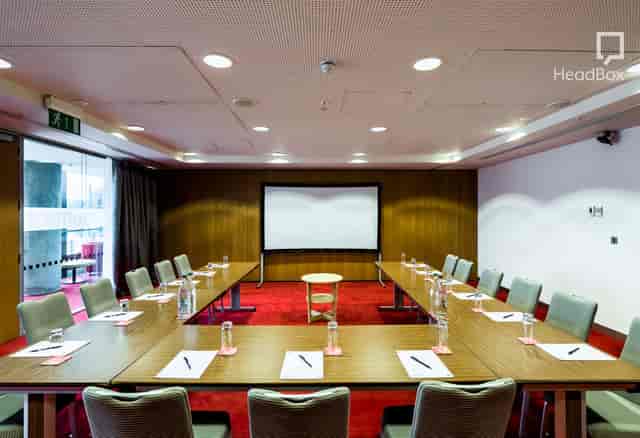 Meeting room with U-shape seating at Unique Venues Birmingham for corporate events.