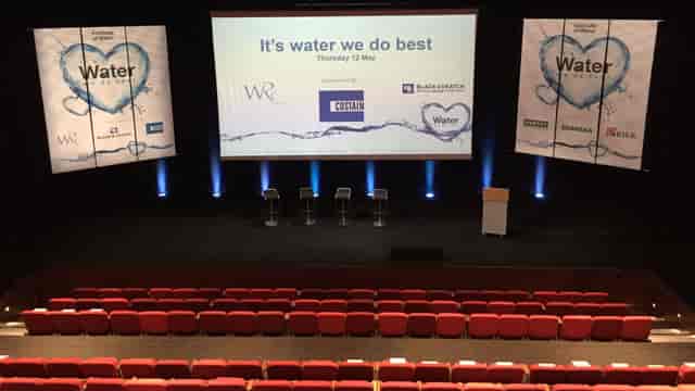 The Studio Theatre stage with panel seating for corporate conferences and professional events.