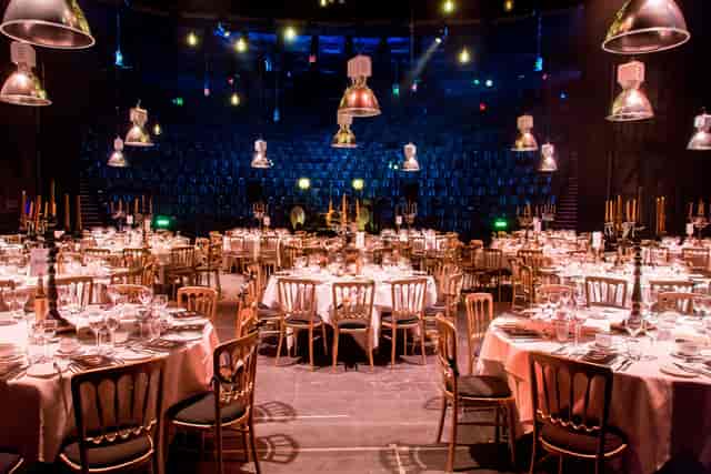 Elegant dinner event space with round tables at Unique Venues Birmingham.