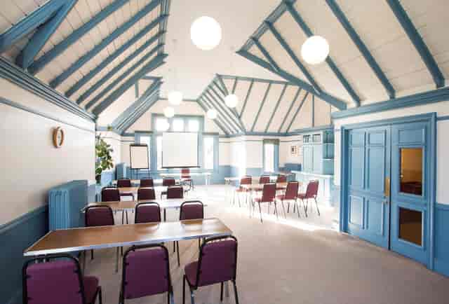 The Stephens Room: Vaulted ceiling meeting space for corporate workshops and training sessions.