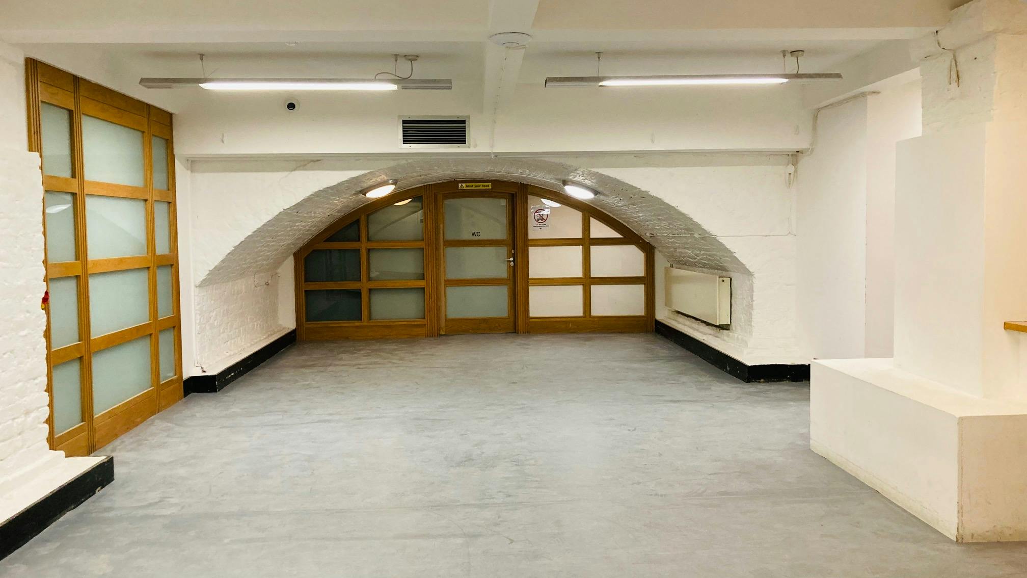 Versatile event space in St John's Hoxton with arched ceilings and natural light.