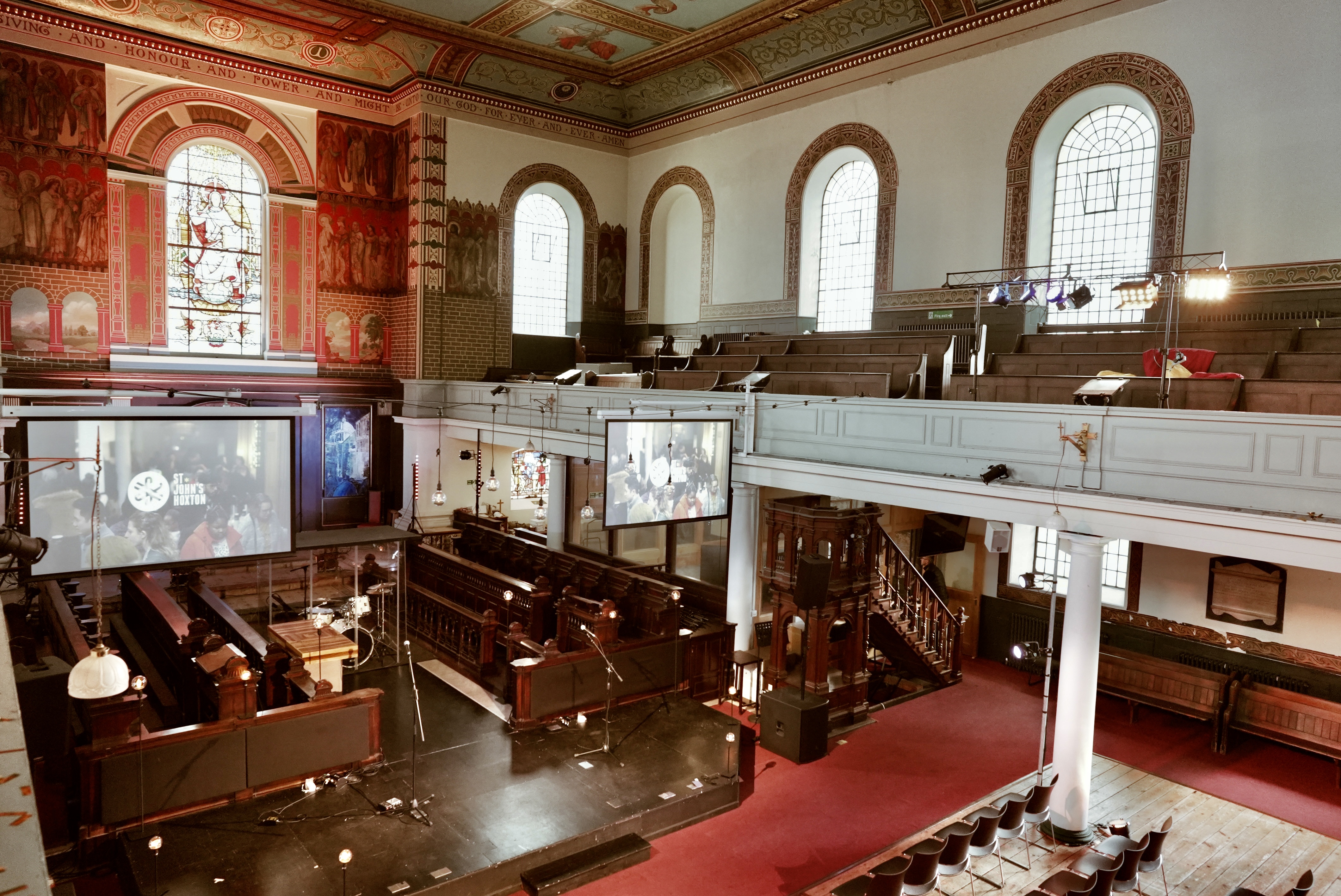 Main Church in St John's Hoxton, featuring stained glass windows, ideal for events and conferences. - Banner