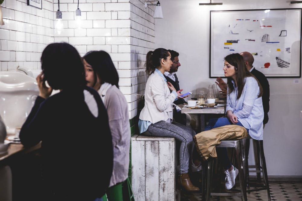 Casual meeting space in Attendant Fitzrovia for networking and brainstorming sessions.