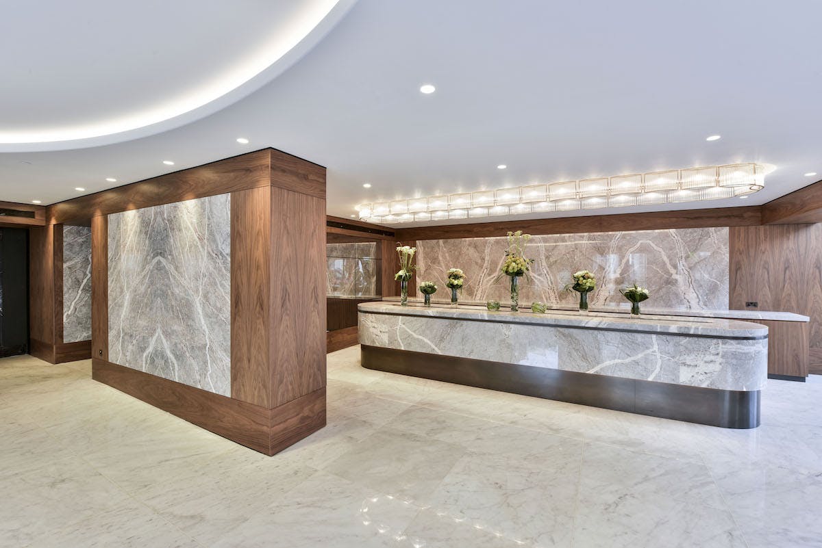 Nine Kings Suite reception, modern marble finishes, ideal for corporate events.