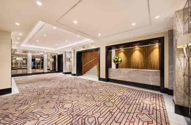 Upscale Westbourne Suite foyer with registration desk for corporate events and gala receptions.