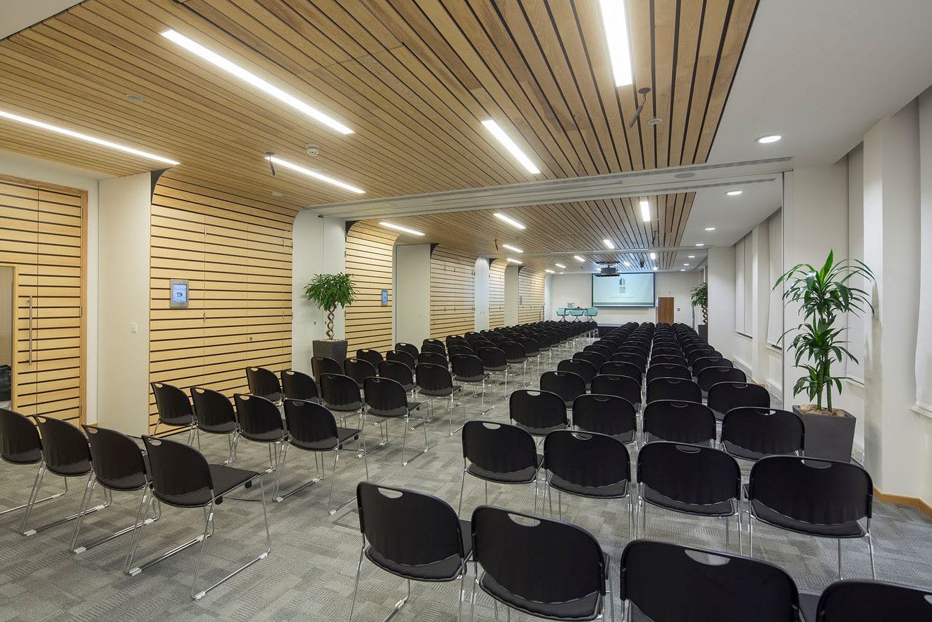 Rippington Suite meeting space with black chairs, ideal for conferences and presentations.