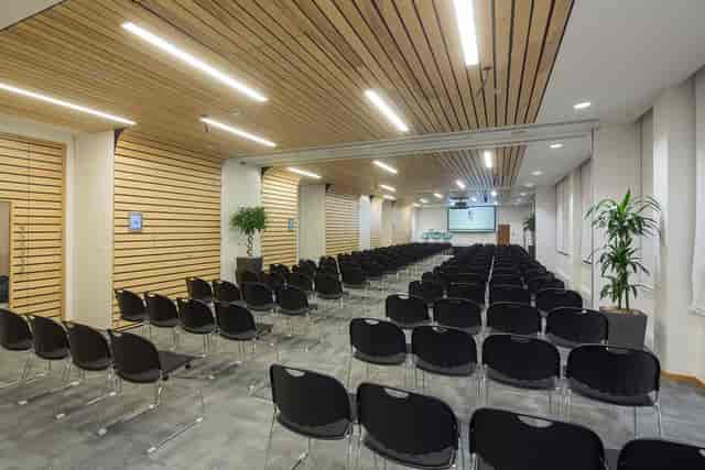 Rippington Suite meeting space with black chairs, ideal for conferences and presentations.