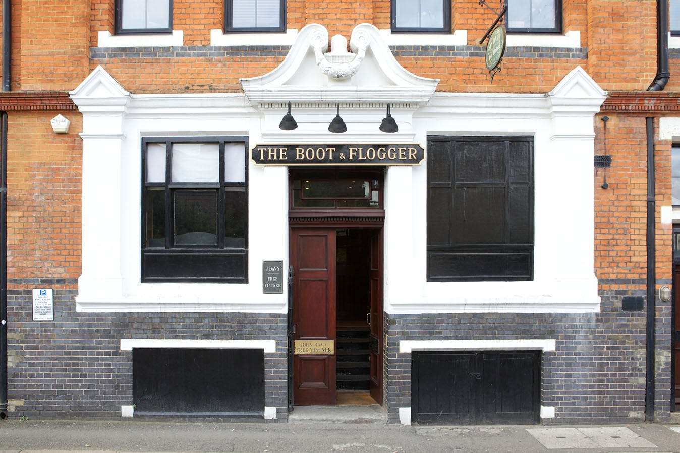 Charming venue entrance at Boot and Flogger for intimate gatherings and networking events.