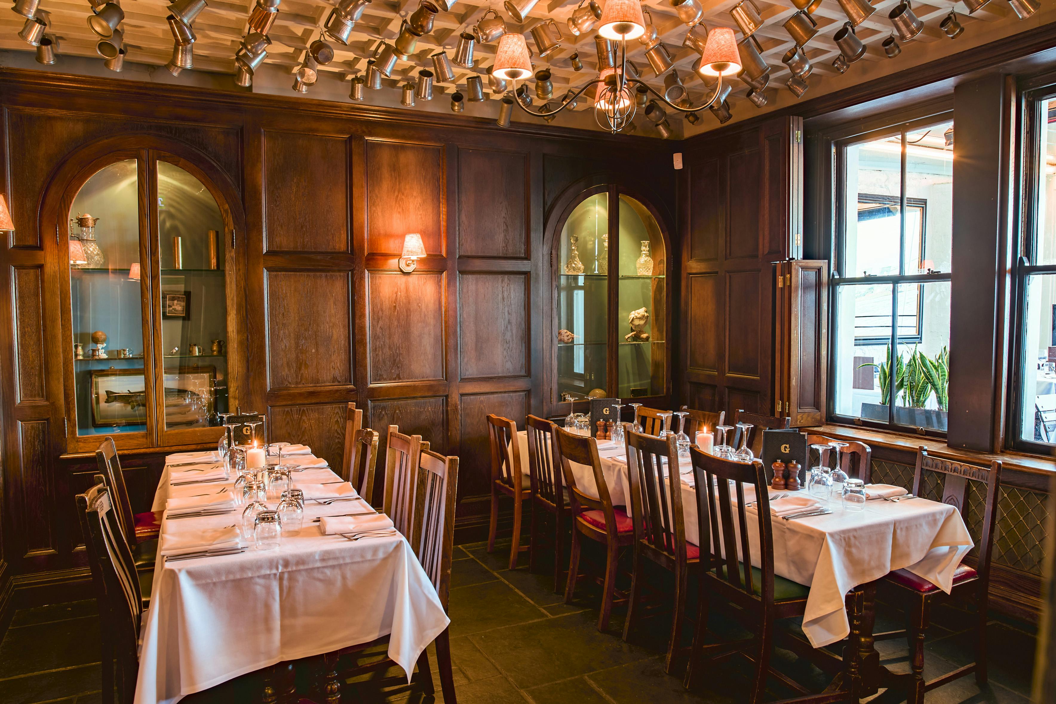 Elegant dining space in The Cabin Room, perfect for corporate dinners and intimate gatherings.