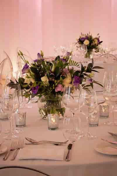 Elegant table setting with floral centerpiece for upscale weddings and events in Sanderson London.