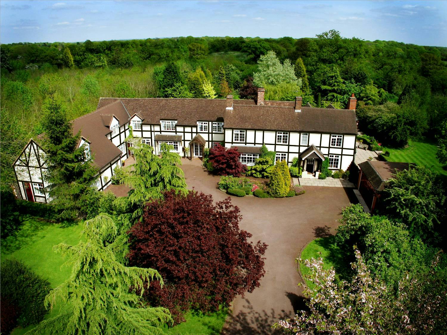 Orchard Suite at The Limes Hotel, ideal venue for meetings and events with lush greenery.