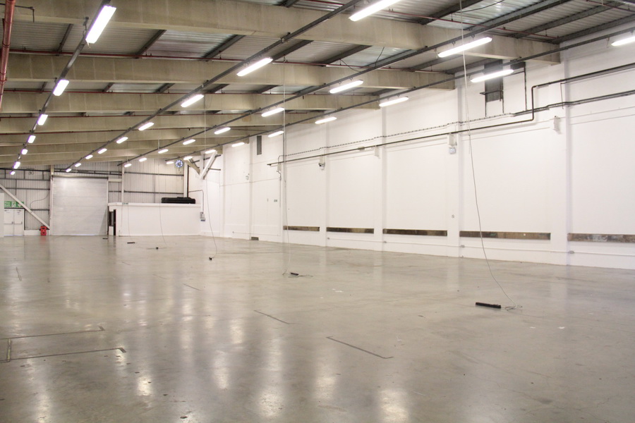 Large empty venue with polished concrete floors at The Old Truman Brewery for events