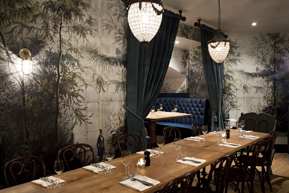 Private dining space in GOAT with elegant table setup for intimate gatherings. - Banner