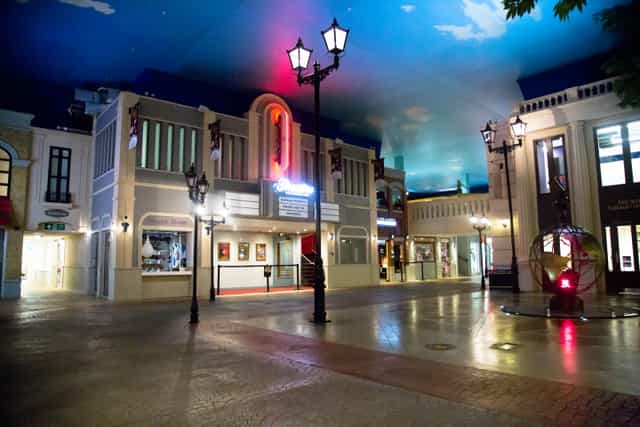 KidZania London Theatre: vibrant event space with whimsical ceiling for receptions and networking.