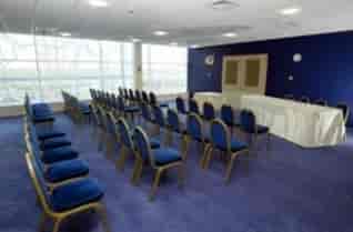 Rowley Suite at King Power Stadium, bright meeting room for seminars and presentations.