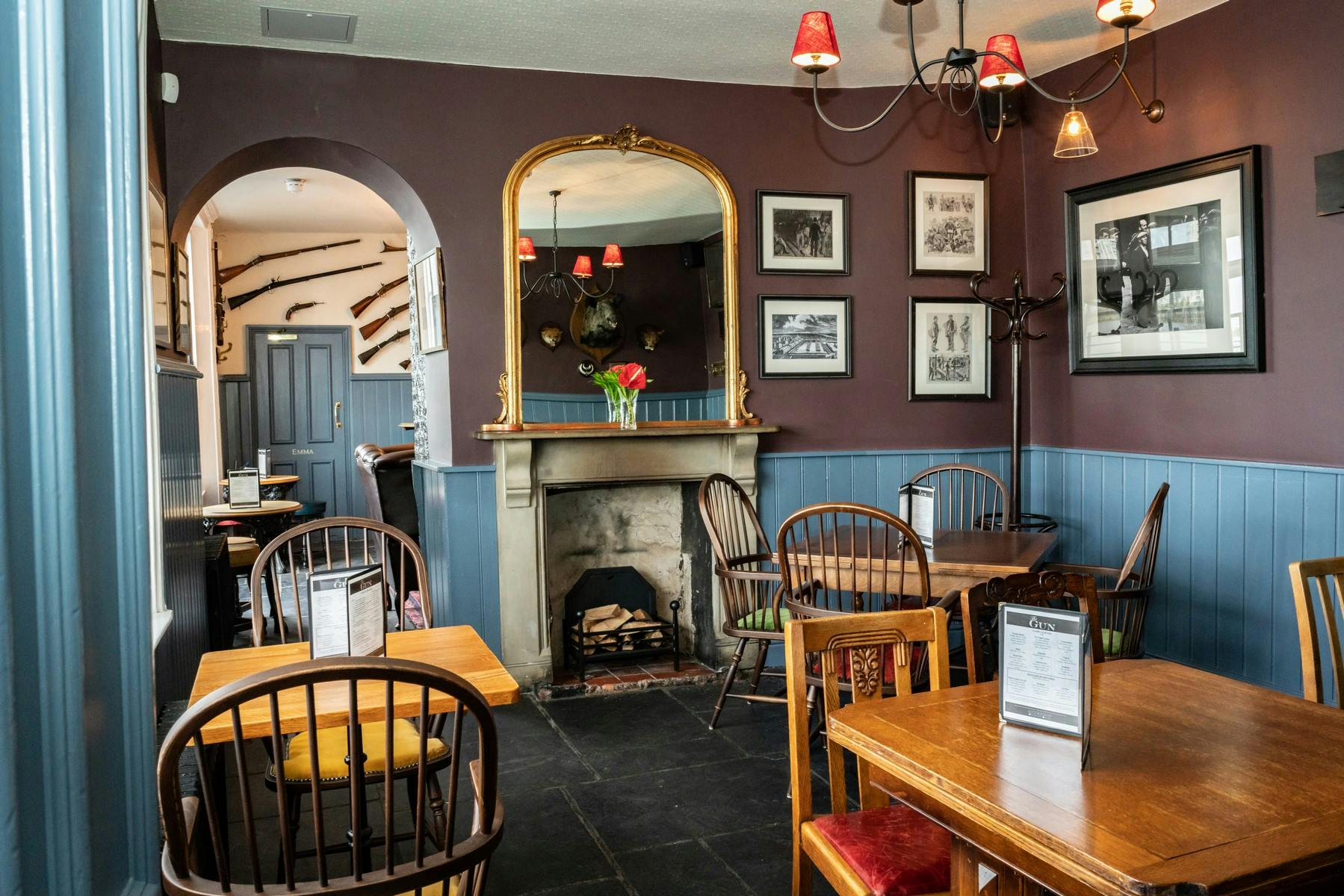 Cozy Red Room in The Gun, ideal for intimate gatherings and networking events.