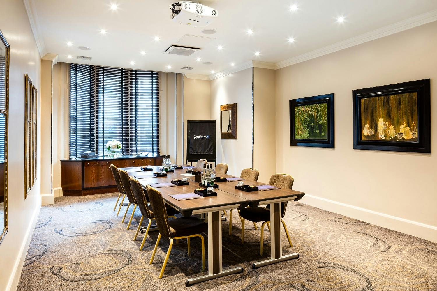 Private Room 7 at Radisson Blu, London: elegant meeting space with natural light for corporate events.