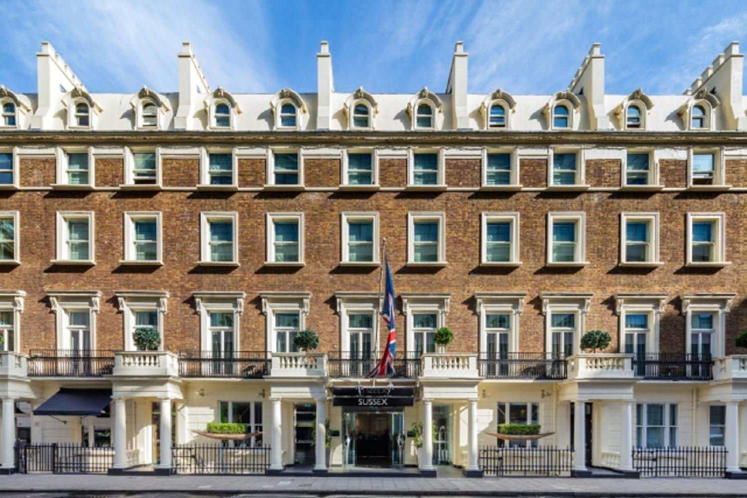 Elegant hotel facade of Green Room, Radisson Blu Sussex, perfect for upscale events.