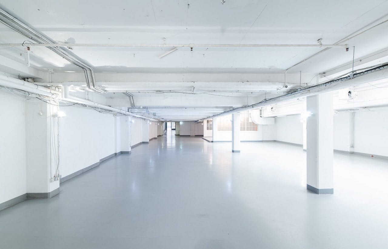 Spacious minimalist venue at The Vinyl Factory Soho for conferences and workshops.